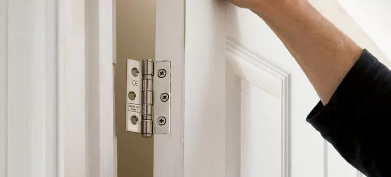 Bathroom Stall Door Hinge Repair in Callaway, FL